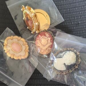 Elegant Gold and Cream Cameo Brooch Set